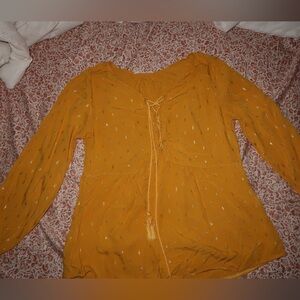 Yellow blouse with gold details